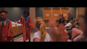 Graduating Students walking the hallways